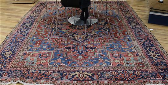 A North West blue and red ground Persian carpet 315 x 230cm